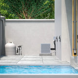 Outdoor patio by a pool with the Omega condenser tucked behind a louvered cover