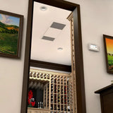 WhisperKOOL Ceiling Mount 8000 evaporator flush in the ceiling of a traditional wood-racked wine cellar