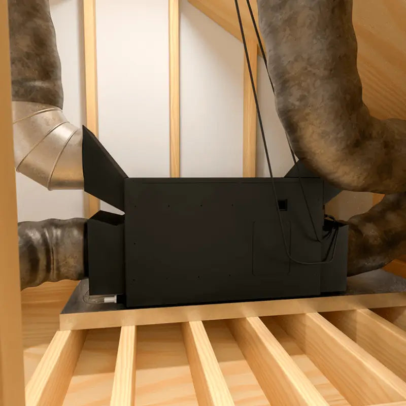 Extreme 5000tiR installed in a framed attic space with insulated ducting run to each collar