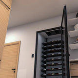 Glass-doored cellar with the Mini ceiling unit recessed above black cantilever racking